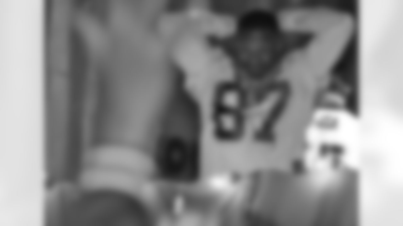 New Orleans Saints wide receiver Joe Horn throws beads to revelers during the Krewe of Endymion Mardi Gras parade in New Orleans, Saturday, Feb. 17, 2007.