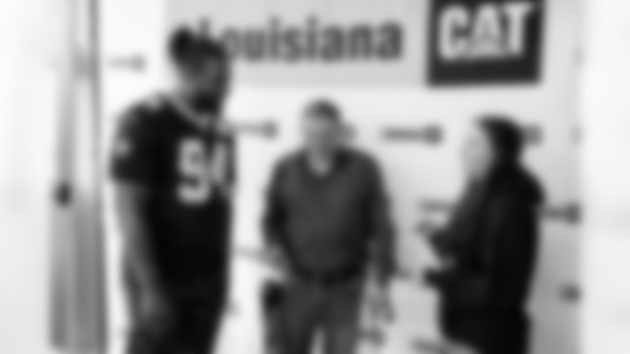 New Orleans Saints defensive end Cameron Jordan joined Louisiana Cat employees for a celebration of Hercules, a US Veteran Service Dog (USVSD) training graduate who was provided to local veteran Michael during the 2024 NFL season.