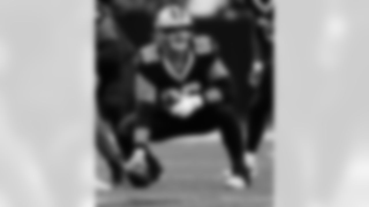 C/G Shane Lemieux (66) prepares to snap during the New Orleans Saints game against the Las Vegas Raiders for Week 17 of the 2024 NFL Season on Dec. 29, 2024 at Caesars Superdome.