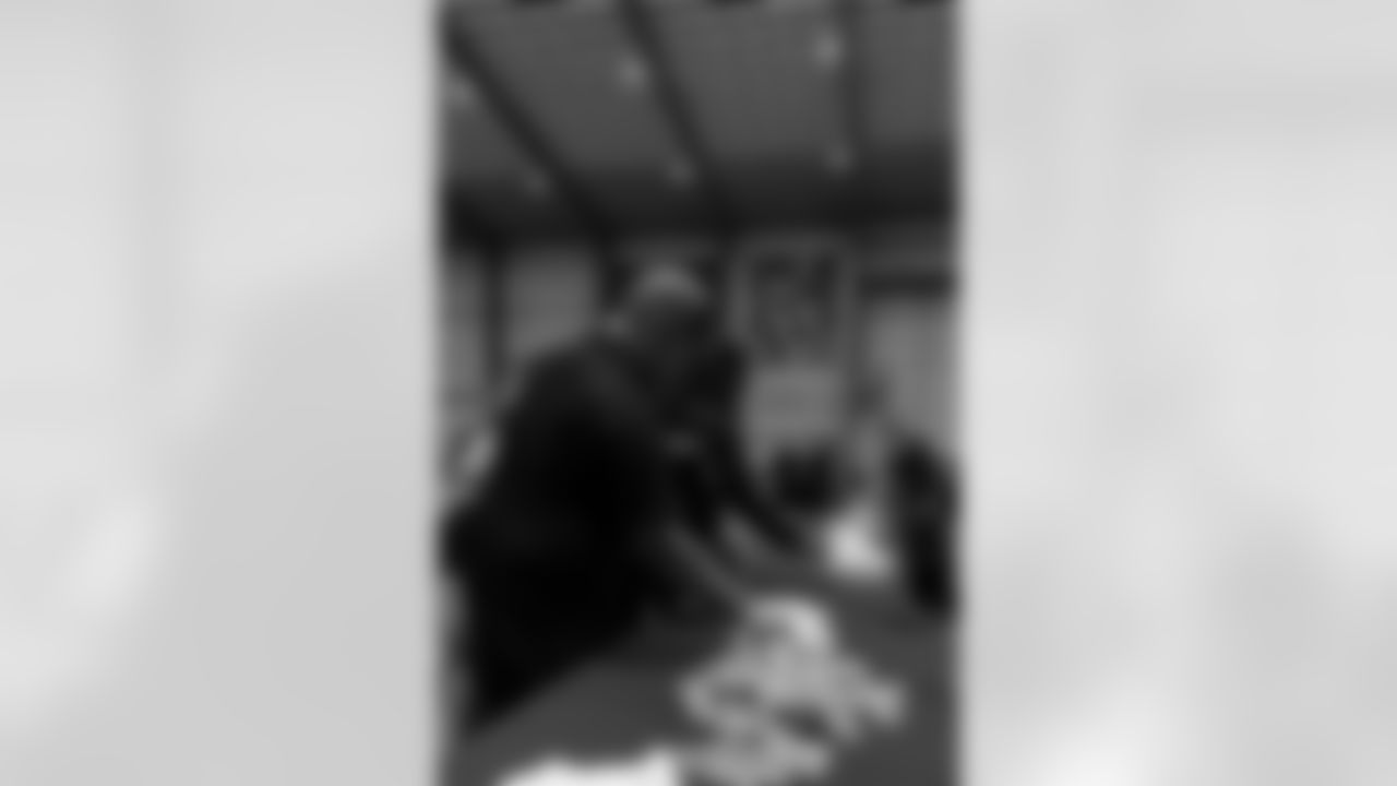 New Orleans Saints owner Gayle Benson and legend Pat Swilling joined volunteers from Entergy and the American Red Cross to assemble care packages for military members as part of the NFL's Salute to Service month on Tuesday, Nov. 11, 2025.