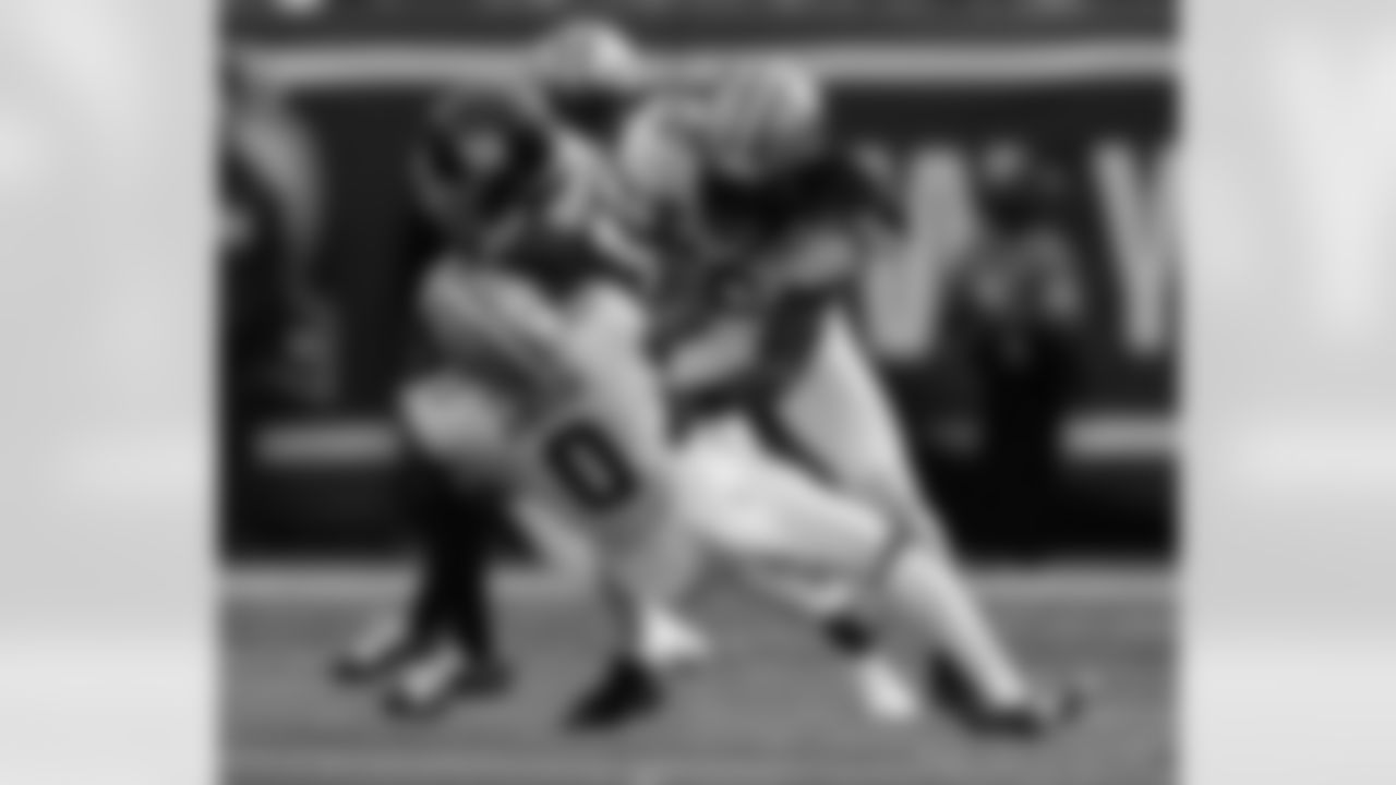 S Ugo Amadi (0) and LB Demario Davis (56) go in for the tackle during the New Orleans Saints game against the New York Giants for Week 14 of the 2024 NFL Season on Dec. 8, 2024 at MetLife Stadium.