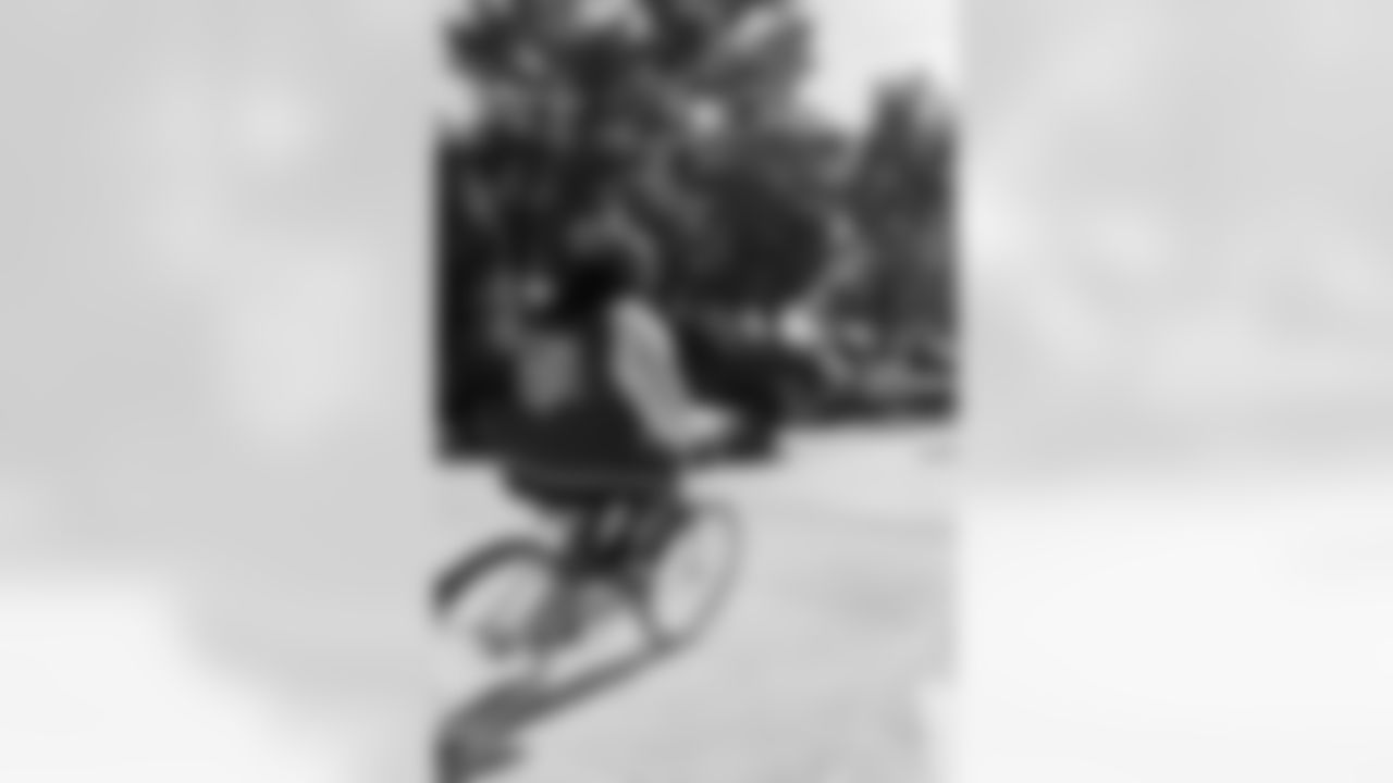 New Orleans Saints quarterback Tyler Shough and defensive end Cam Jordan joined Raising Cane's to surprise 100 kids from the Boys and Girls Club of Metro Louisiana with new bikes and helmets for the holidays on Tuesday, Dec. 9, 2025.