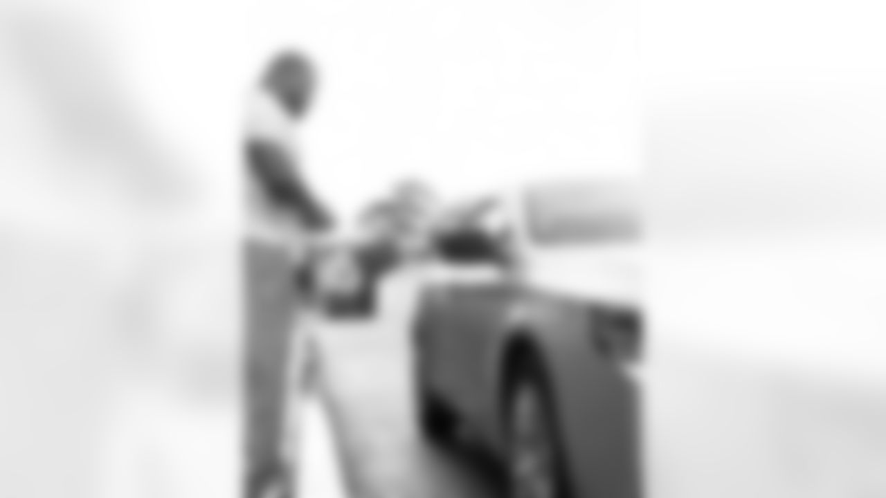 New Orleans Saints defensive tackle Davon Godchaux hosted a Thanksgiving turkey distribution for local residents at the COPAC Community Center on Nov. 25, 2025. The Plaquemine High School football team assisted Godchaux in the giveaway.