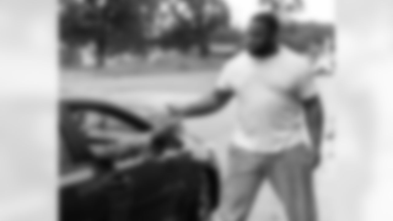 New Orleans Saints defensive tackle Davon Godchaux hosted a Thanksgiving turkey distribution for local residents at the COPAC Community Center on Nov. 25, 2025. The Plaquemine High School football team assisted Godchaux in the giveaway.