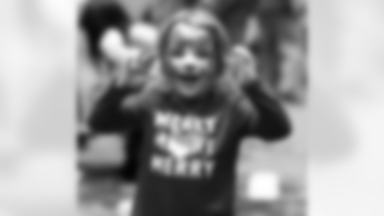 Check out the best reaction photos from fans during various Saints player community visits throughout the month of November 2023.