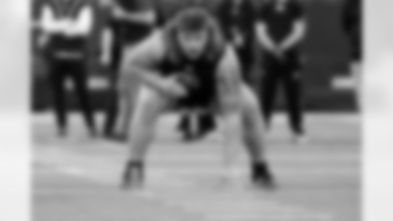Iowa offensive lineman Gennings Dunker (20) participates in a drill during the 2026 NFL Scouting Combine on Sunday, March 1, 2026 in Indianapolis, Indiana.