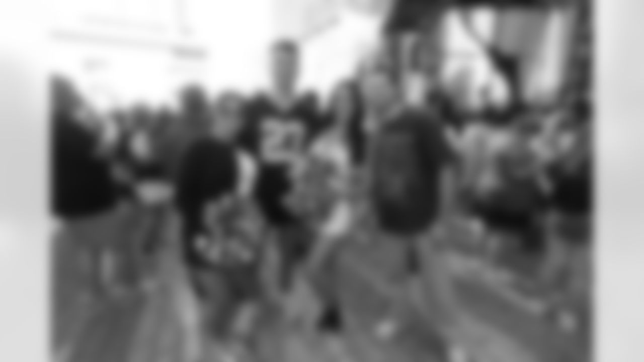 New Orleans Saints fans enjoyed the Week 12 entertainment in Champions Square ahead of the game against the Atlanta Falcons during the 2025 NFL season on Nov. 23, 2025.