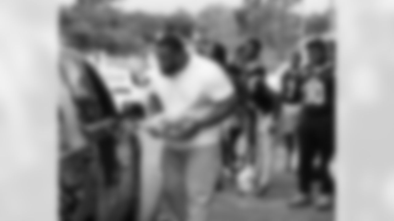 New Orleans Saints defensive tackle Davon Godchaux hosted a Thanksgiving turkey distribution for local residents at the COPAC Community Center on Nov. 25, 2025. The Plaquemine High School football team assisted Godchaux in the giveaway.