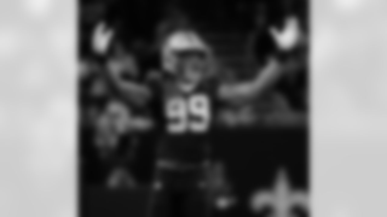 Check out the best photos of the New Orleans defense in their game against the Carolina Panthers for Week 15 of the 2025 NFL season on Dec. 14, 2025, at Caesars Superdome.