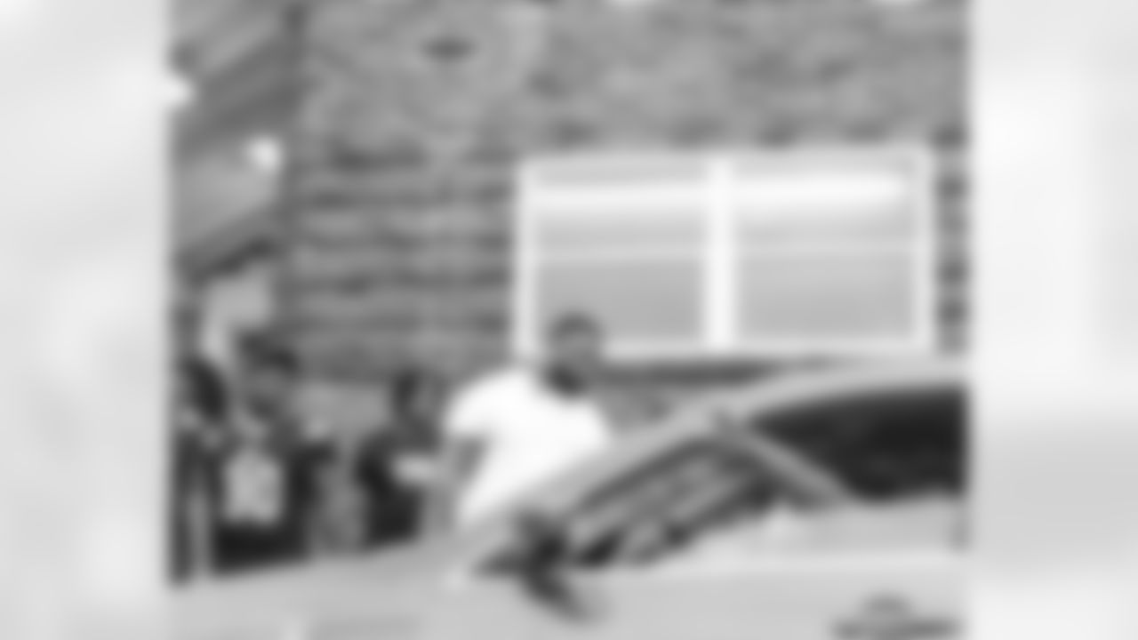 New Orleans Saints defensive tackle Davon Godchaux hosted a Thanksgiving turkey distribution for local residents at the COPAC Community Center on Nov. 25, 2025. The Plaquemine High School football team assisted Godchaux in the giveaway.