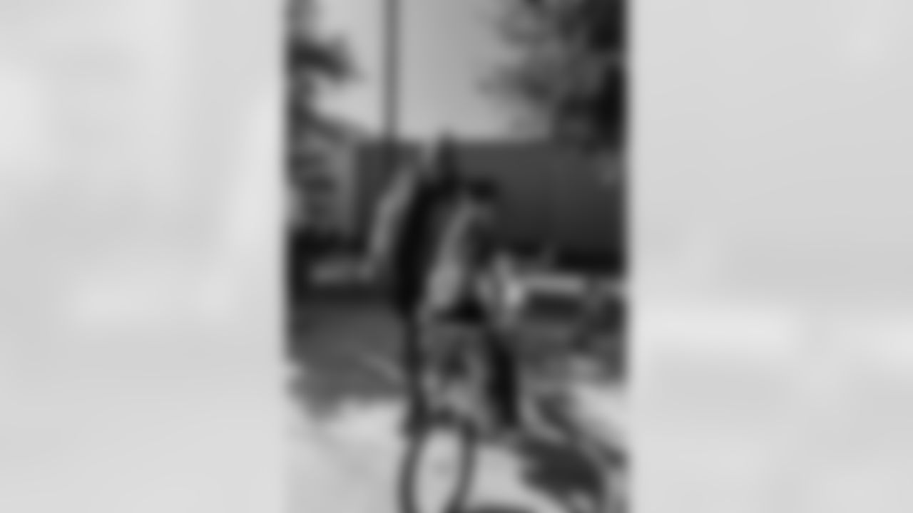 New Orleans Saints quarterback Tyler Shough and defensive end Cam Jordan joined Raising Cane's to surprise 100 kids from the Boys and Girls Club of Metro Louisiana with new bikes and helmets for the holidays on Tuesday, Dec. 9, 2025.