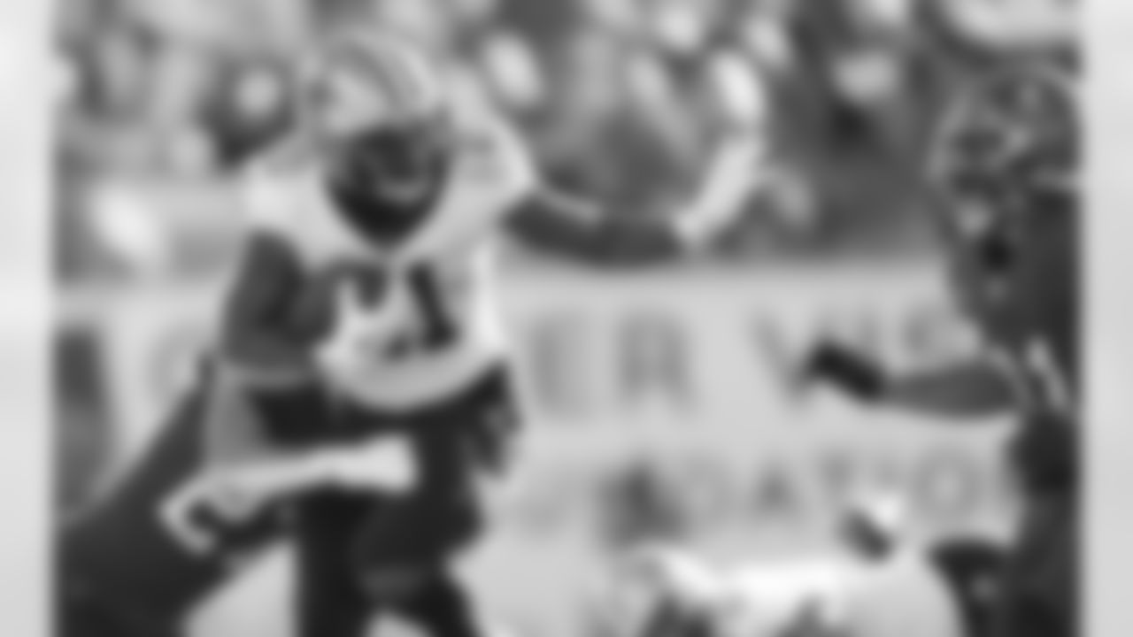 Check out photos of New Orleans Saints running back Jamaal Williams in action throughout the 2023 NFL season.
