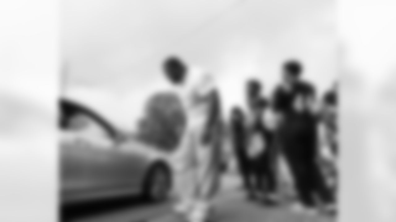 New Orleans Saints defensive tackle Davon Godchaux hosted a Thanksgiving turkey distribution for local residents at the COPAC Community Center on Nov. 25, 2025. The Plaquemine High School football team assisted Godchaux in the giveaway.