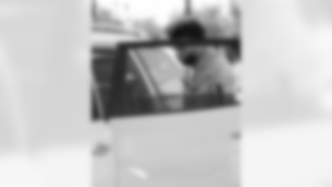 Chris Olave and The Olave Family Foundation volunteered with Lighthouse Nola and Second Harvest Food Bank for their Thanksgiving turkey drive through on Nov. 25, 2025.