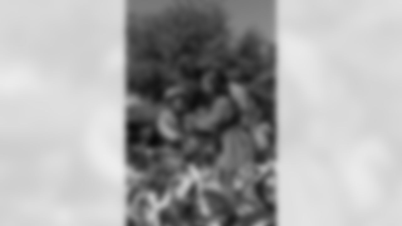 New Orleans Saints quarterback Tyler Shough and defensive end Cam Jordan joined Raising Cane's to surprise 100 kids from the Boys and Girls Club of Metro Louisiana with new bikes and helmets for the holidays on Tuesday, Dec. 9, 2025.