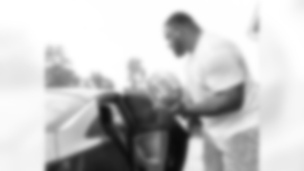 New Orleans Saints defensive tackle Davon Godchaux hosted a Thanksgiving turkey distribution for local residents at the COPAC Community Center on Nov. 25, 2025. The Plaquemine High School football team assisted Godchaux in the giveaway.