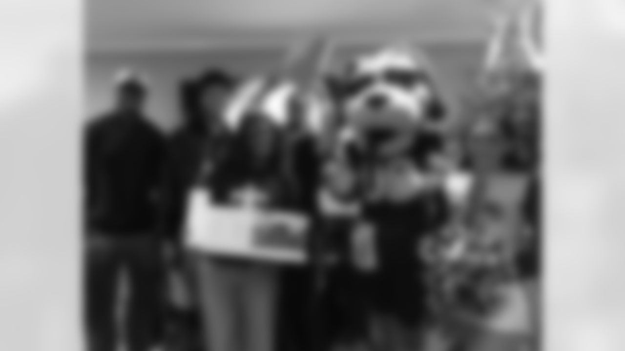 New Orleans Saints tight end Juwan Johnson, cornerback Alontae Taylor, and wide receiver Devaughn Vele attended the Louisiana Cat Hope Ignites Holiday Party on Tuesday, Dec. 16, 2025.