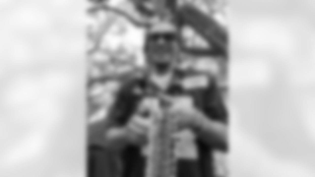 New Orleans Saints players rode down the Uptown route with the Krewe of Tucks as they presented their 58th annual parade on Saturday, February 14 during the 2026 Mardi Gras season.