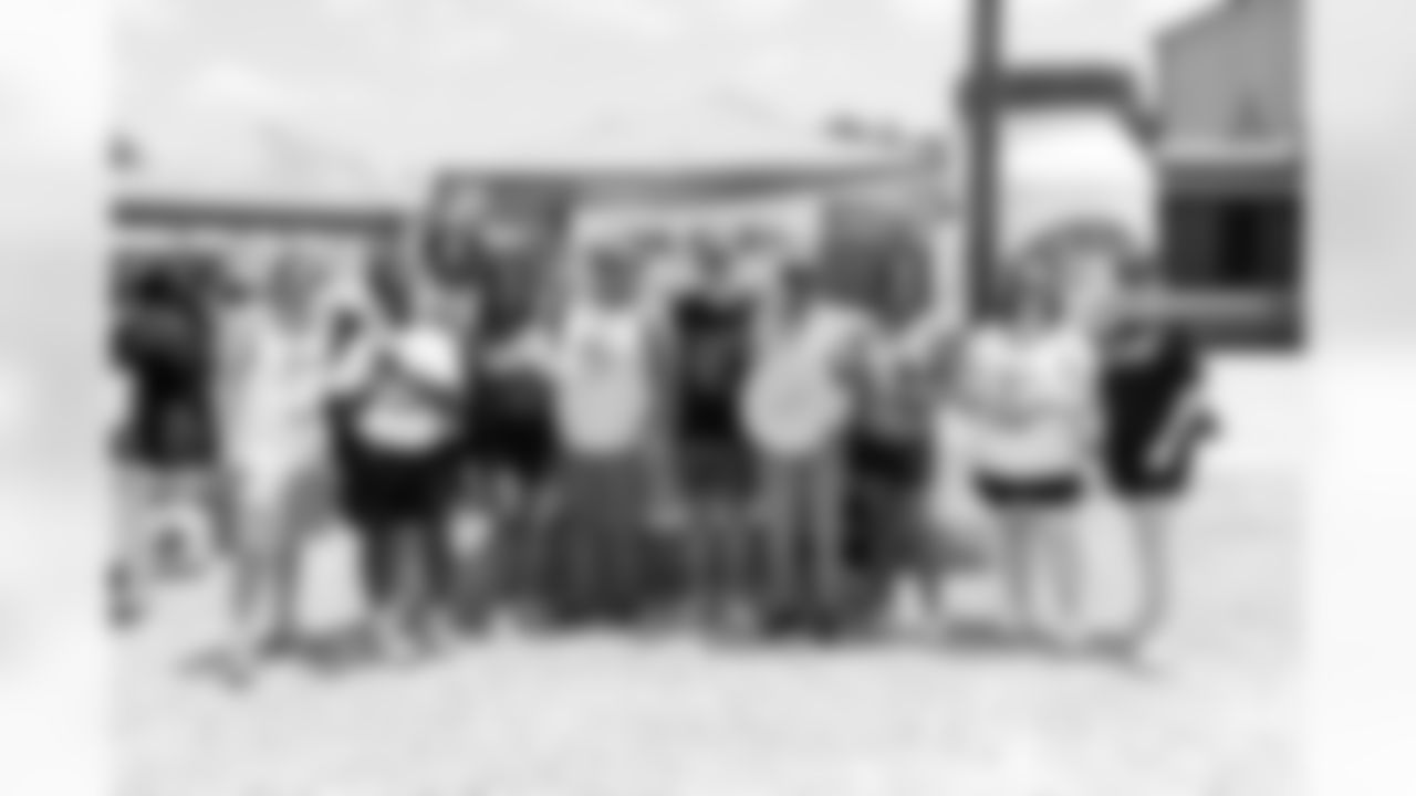 Staff members for the New Orleans Saints and Blue Plate Mayonnaise participated in the 2025 Build and Boil put on by Rebuilding Together New Orleans on Saturday, May 17, 2025. Volunteers participated in home repairs and then enjoyed a crawfish boil.