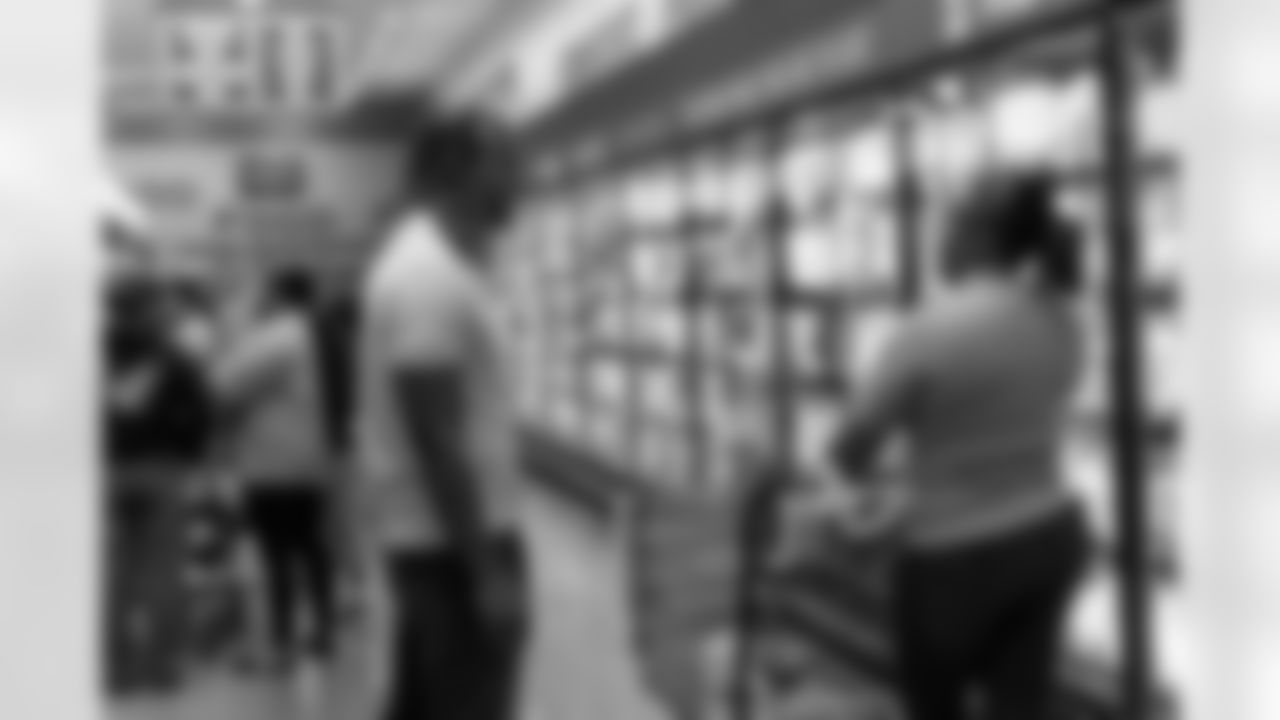 New Orleans Saints safety Justin Reid hosted his annual "Justin's Thanksgiving Grocery Grab" shopping spree for local shoppers on Nov. 24, 2025. Saints safety Terrell Burgess assisted their teammate during the event.