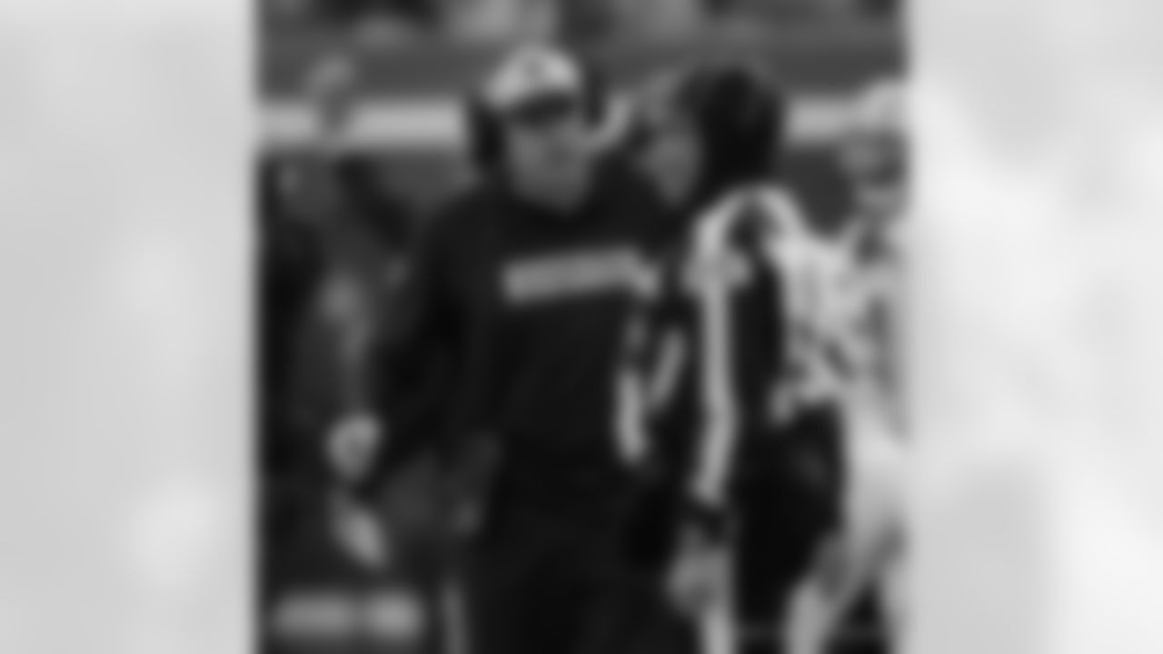 Saints Interim Head Coach speaks with the referee during the New Orleans Saints game against the New York Giants for Week 14 of the 2024 NFL Season on Dec. 8, 2024 at MetLife Stadium.