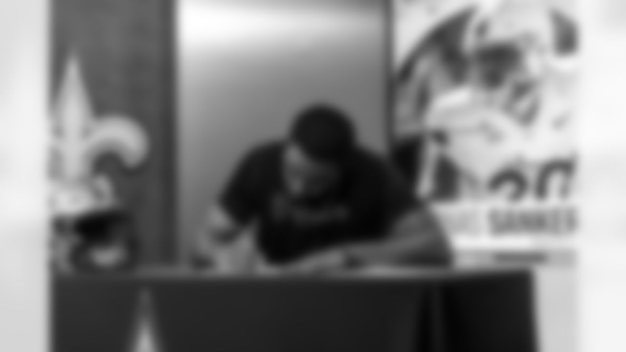Members of the New Orleans Saints 2025 NFL Draft class sign their rookie contracts at the Ochsner Sports Performance Center.