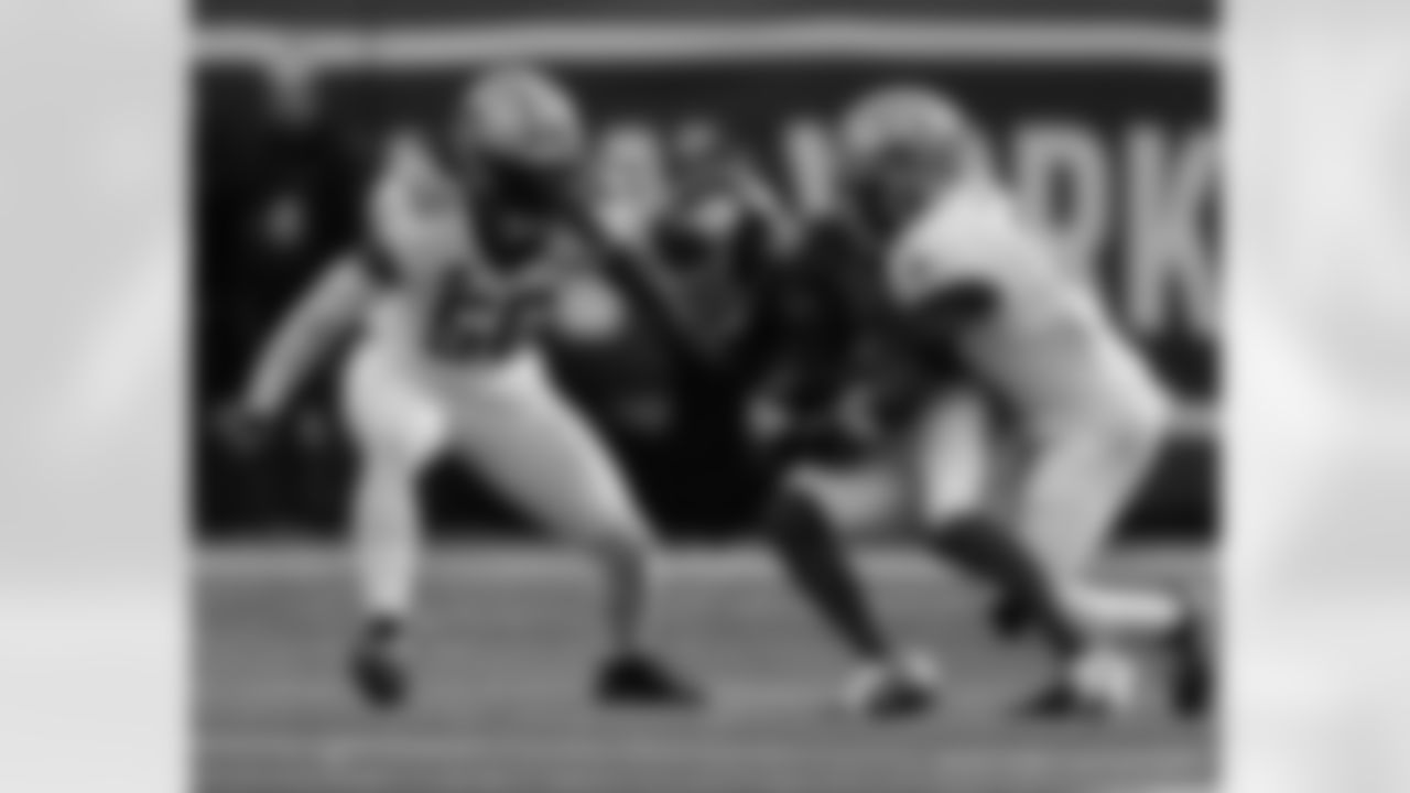 S Ugo Amadi (0) and LB Demario Davis (56) go in for the tackle during the New Orleans Saints game against the New York Giants for Week 14 of the 2024 NFL Season on Dec. 8, 2024 at MetLife Stadium.