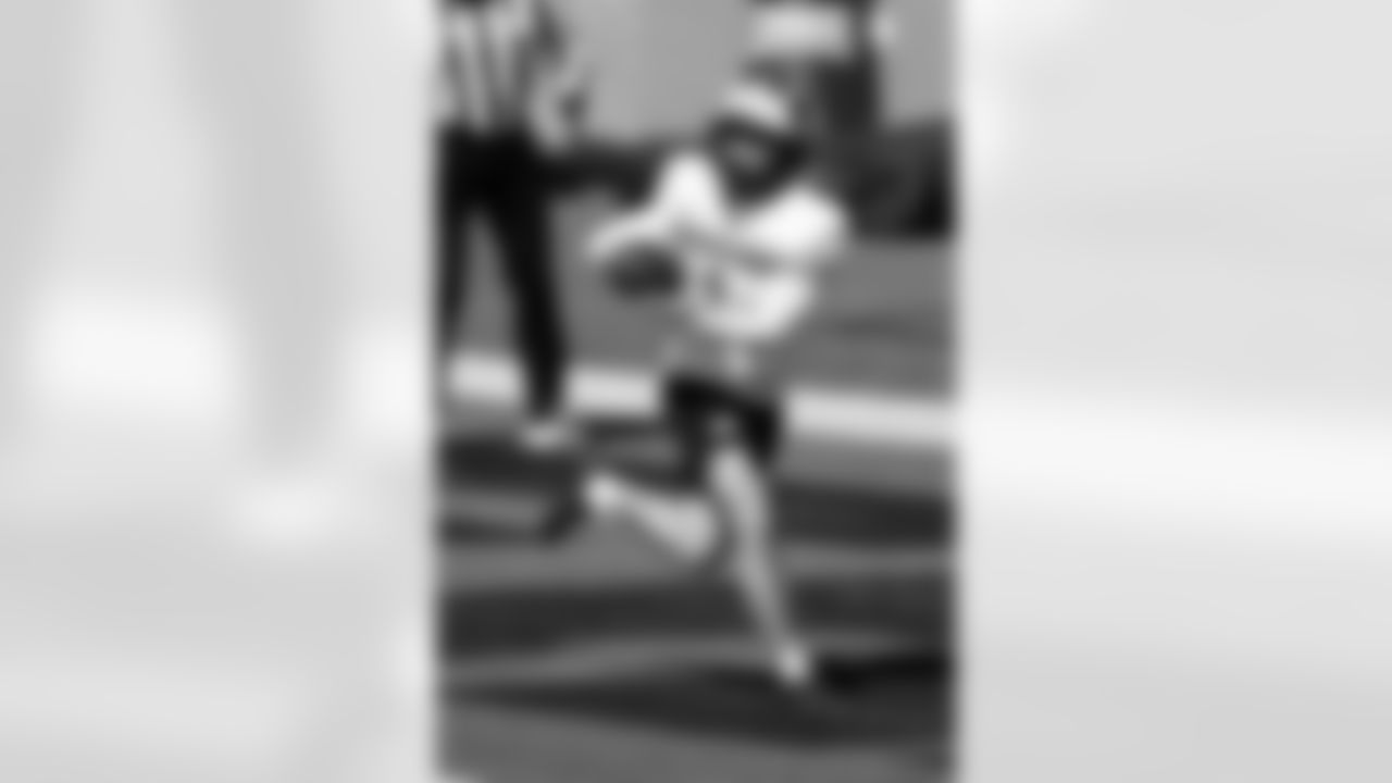 National wide receiver Roman Wilson of Michigan runs through drills during practice for the Senior Bowl NCAA college football game, Tuesday, Jan. 30, 2024, in Mobile, Ala. (AP Photo/ Butch Dill)