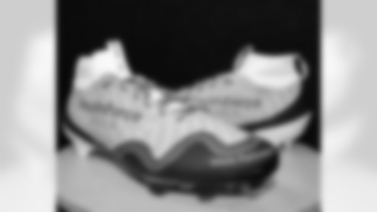 Get a preview as New Orleans Saints owner Gayle Benson, players and coaches honor their personal causes and foundations for the 2025 NFL My Cause My Cleats initiative during their Week 12 game against the Atlanta Falcons.
Tyler Shough: Youth Force Nola | Artist: Ebbie Thomas