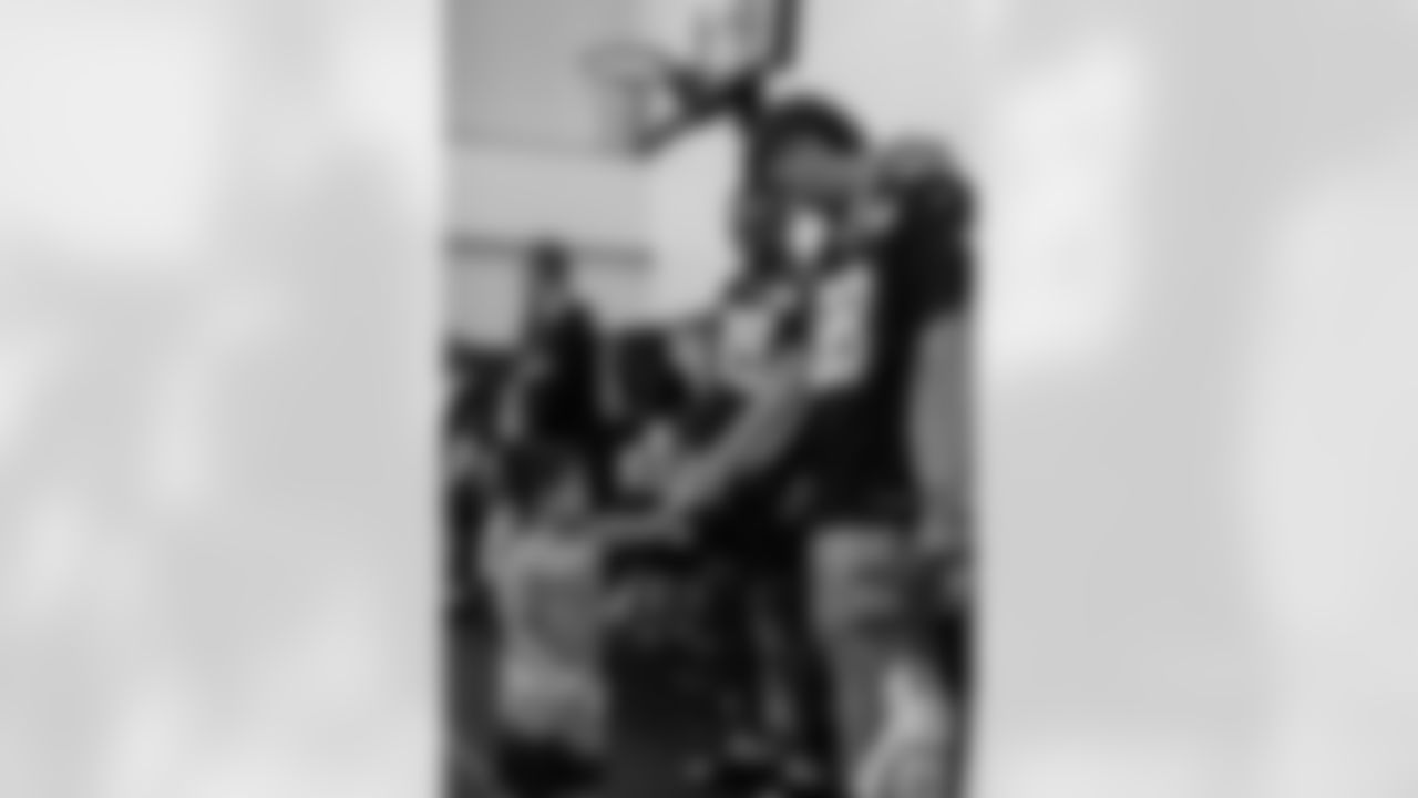 New Orleans Saints players hosted their annual Thanksgiving turkey giveaway at Dryades YMCA on Tuesday, Nov. 18, 2025. The players purchased turkeys and fixings from Rouses Markets to feed families in need, while giving them the opportunity to meet some of their favorite players during the annual holiday event.