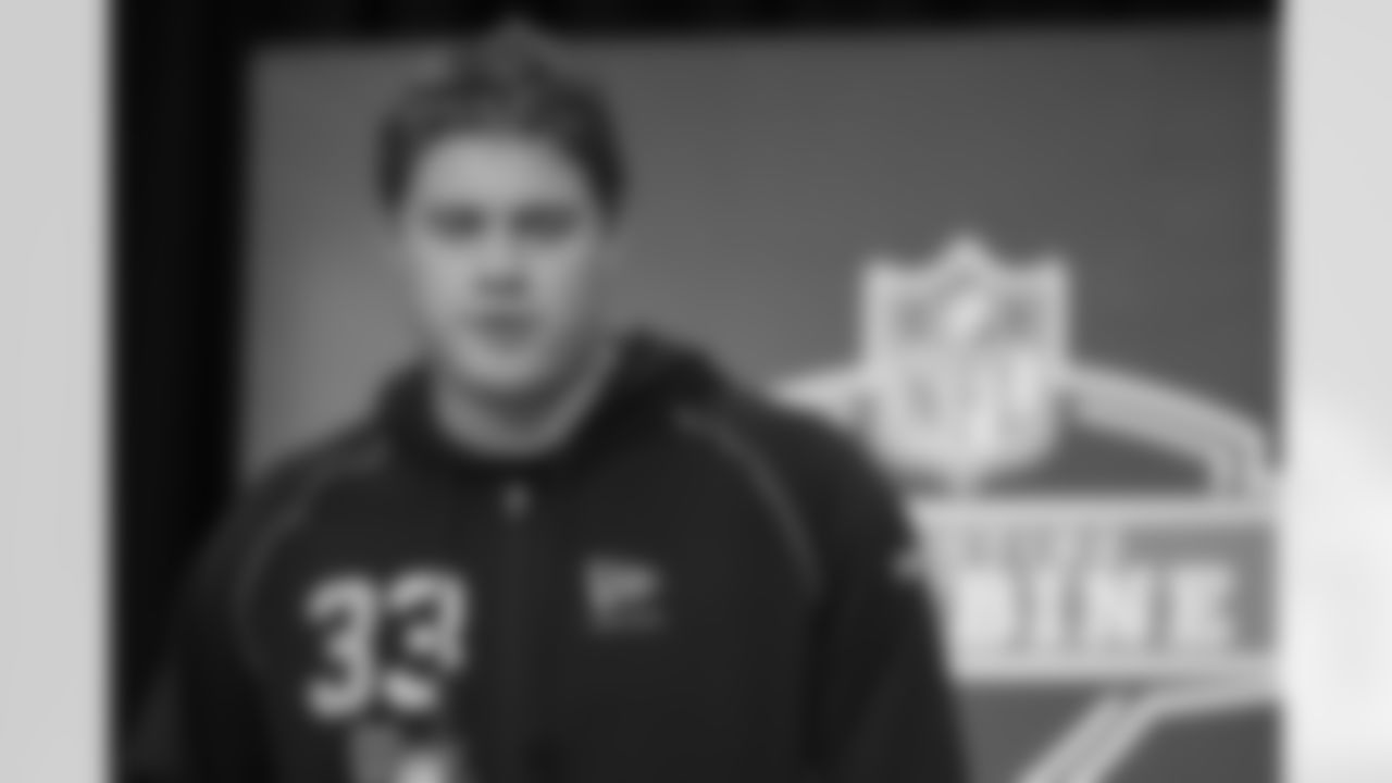 Utah offensive lineman Caleb Lomu (33) speaks during a press conference at the NFL football scouting combine in Indianapolis, Saturday, Feb. 28, 2026.