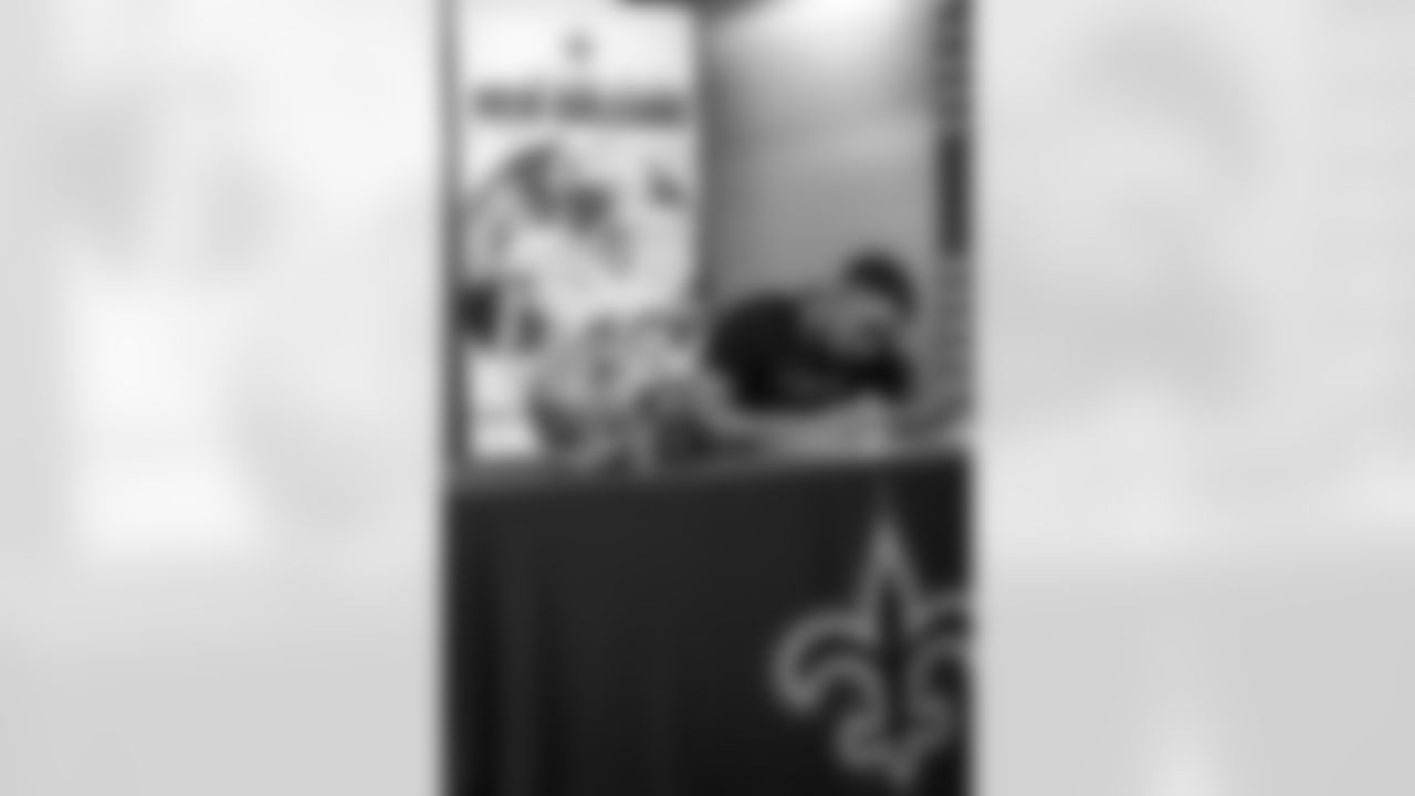 Members of the New Orleans Saints 2025 NFL Draft class sign their rookie contracts at the Ochsner Sports Performance Center.