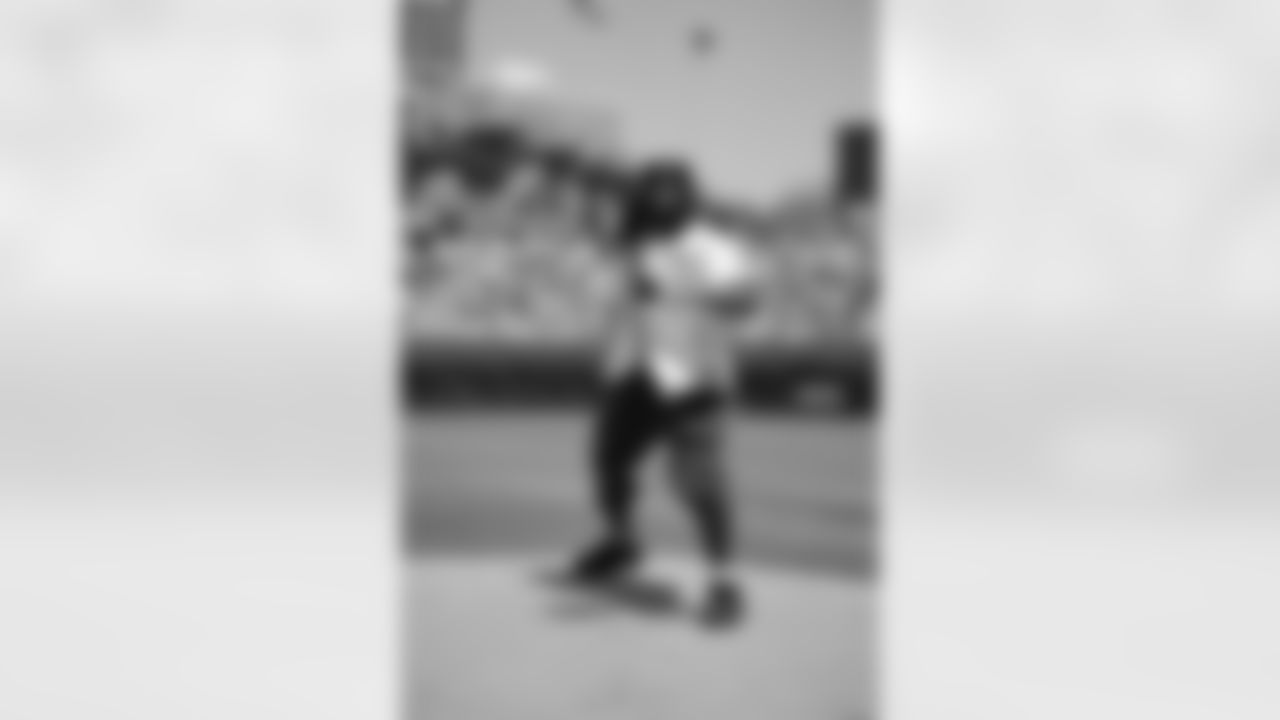 Saints running back Alvin Kamara threw out the first pitch at the Chicago Cubs game against the St. Louis Cardinals at Wrigley Field on Saturday, July 5, 2025.