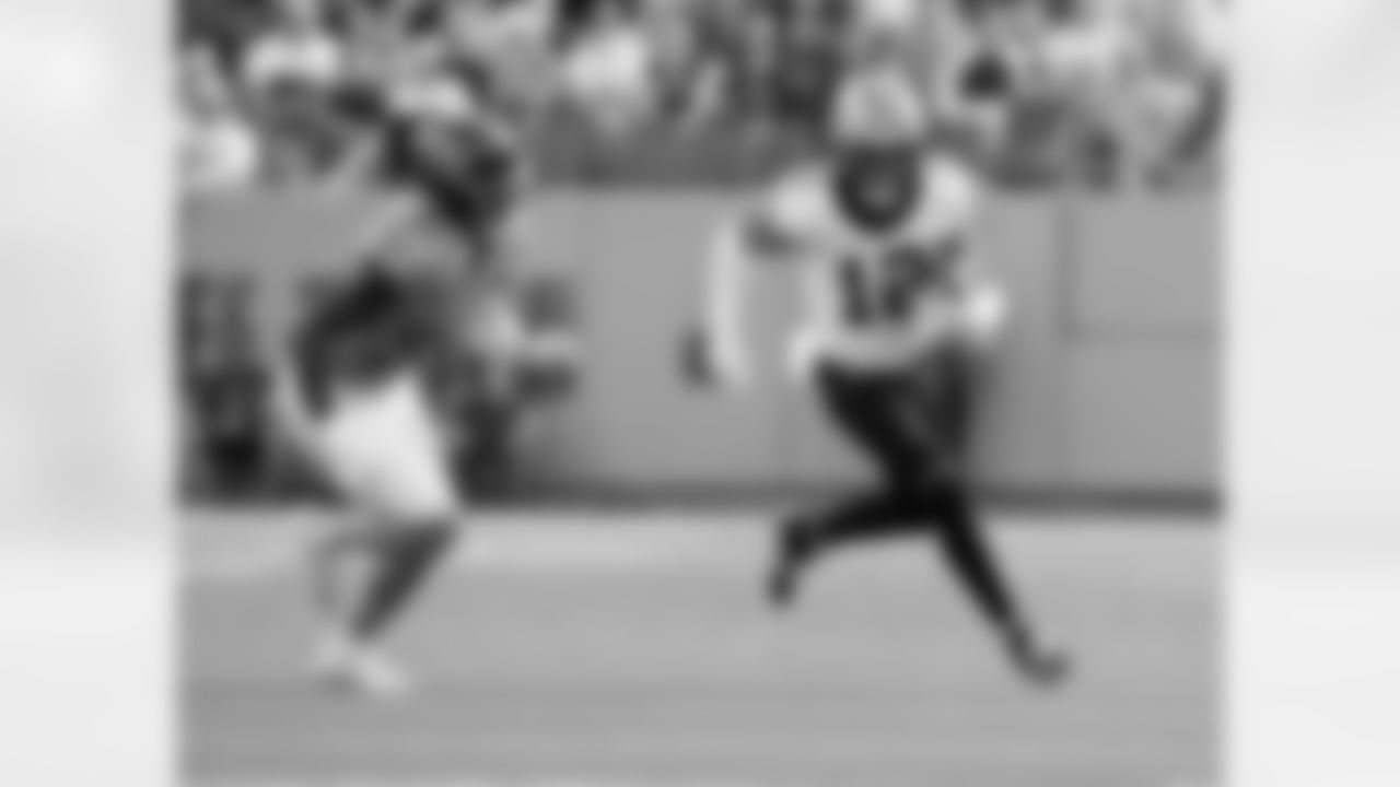 WR Chris Olave (12) runs with the ball during the New Orleans Saints game against the Tennessee Titans for Week 17 of the 2025 NFL season on Dec. 28, 2025 at Nissan Stadium.