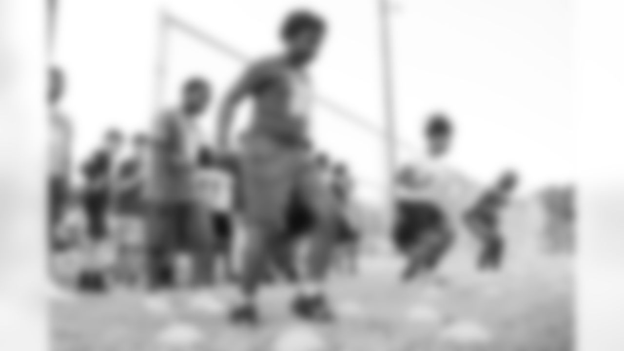 The New Orleans Saints hosted a youth football camp at Bayou Manchac Park in Baton Rouge on Tuesday, June 11, 2024. Campers learned both offensive and defensive drills that they can use to help develop their skills.