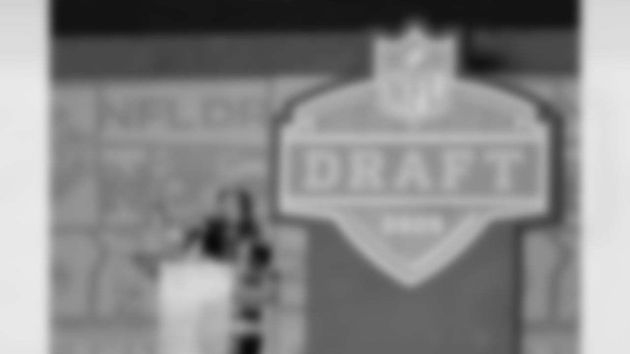 Margaux Schmidt, International Fan of the Year from France, announces a pick for the New Orleans Saints on the third day of the 2025 NFL Draft in Green Bay, Wis., Saturday, April 26, 2025.