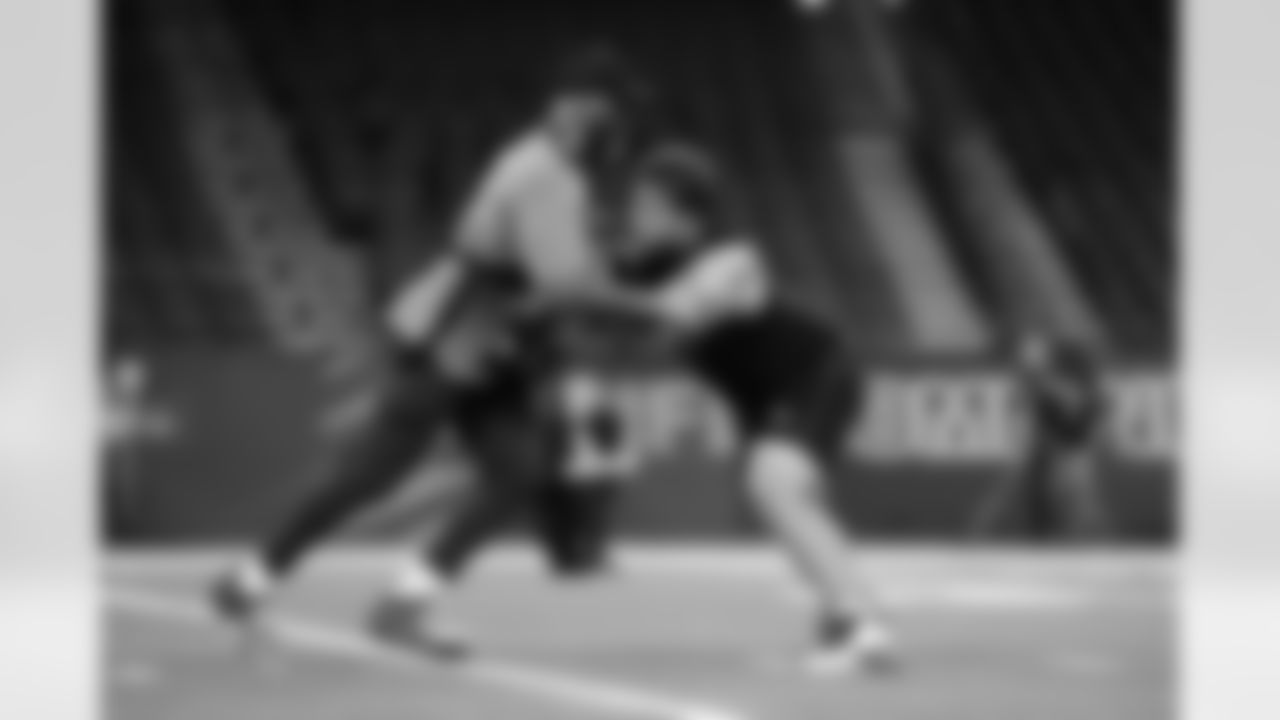 Utah offensive lineman Caleb Lomu (33) participates in a drill during the 2026 NFL Scouting Combine on Sunday, March 1, 2026 in Indianapolis, Indiana.