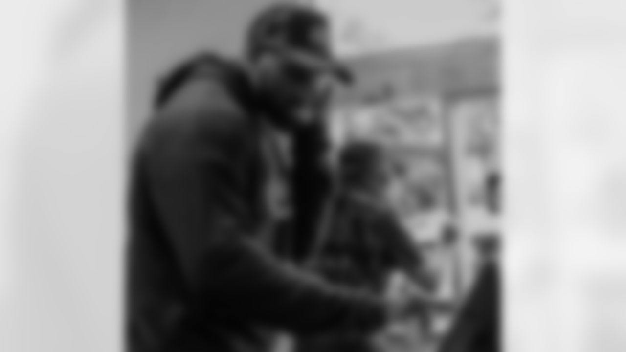 New Orleans Saints tight end Juwan Johnson and his wife Chanen joined Take Paws Rescue for a pet adoption event at the Raising Cane's on Veterans Boulevard on Tuesday, November 21, 2023.