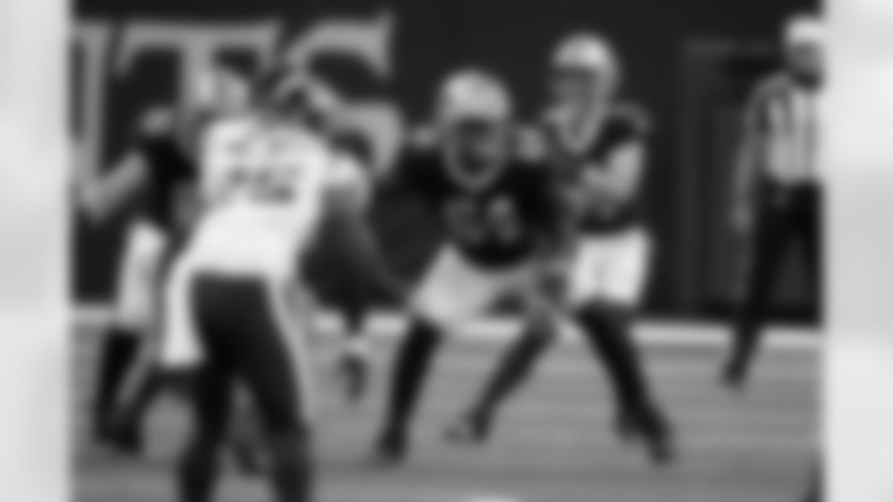 New Orleans Saints offensive tackle Nick Saldiveri (64) blocks for quarterback Jake Haener (14) in the second half of an NFL preseason football game against the Houston Texans in New Orleans, Sunday, Aug. 27, 2023.