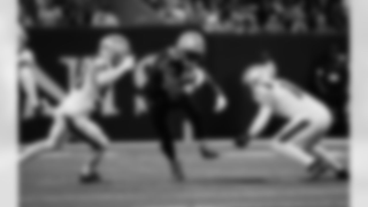 TE Juwan Johnson (83) attempts to break away during the New Orleans Saints game against the New England Patriots for Week 6 of the 2025 NFL season on October 12, 2025 at Caesars Superdome.