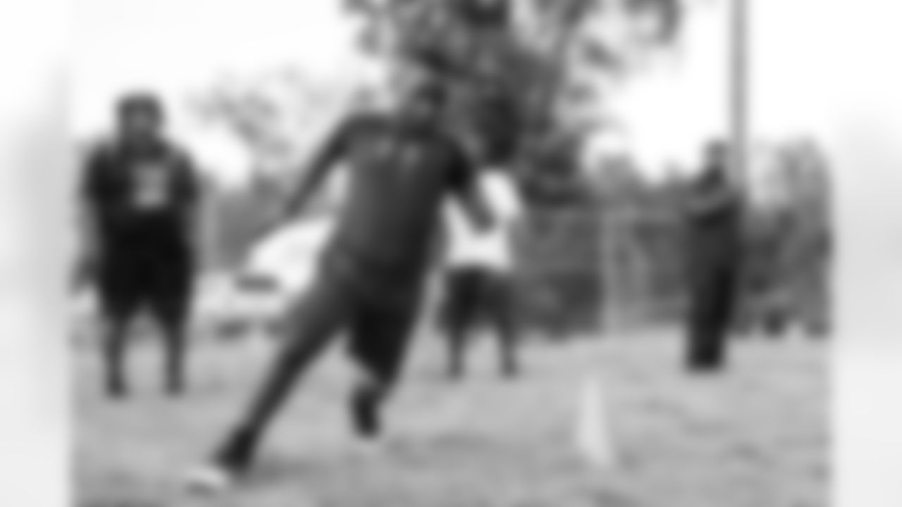 The New Orleans Saints hosted a youth football camp at Bayou Manchac Park in Baton Rouge on Tuesday, June 11, 2024. Campers learned both offensive and defensive drills that they can use to help develop their skills.