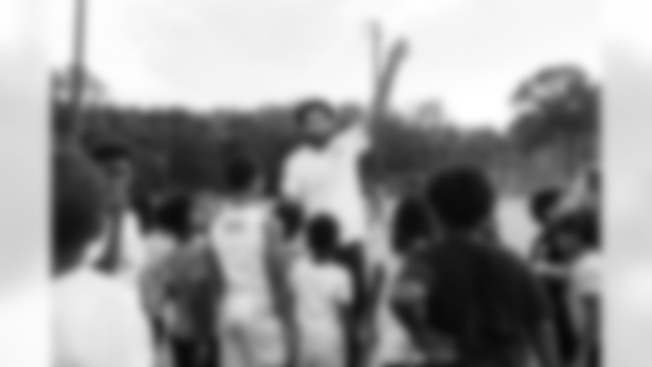 The New Orleans Saints hosted a youth football camp at Bayou Manchac Park in Baton Rouge on Tuesday, June 11, 2024. Campers learned both offensive and defensive drills that they can use to help develop their skills.