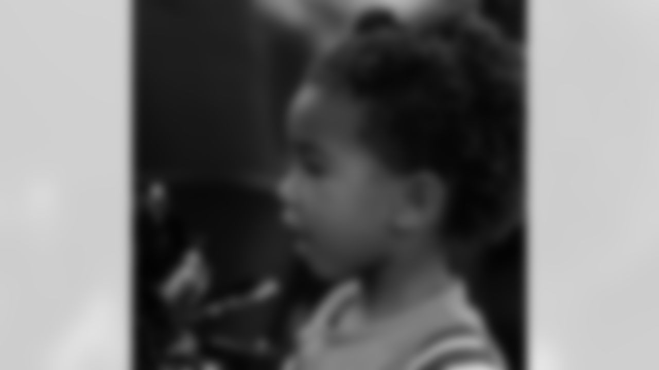 Check out the best reaction photos from fans during various Saints player community visits throughout the month of November 2023.