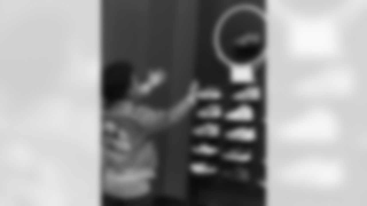 New Orleans Saints wide receiver Chris Olave surprised local youth with a holiday shopping spree in Metairie on December 9, 2025.