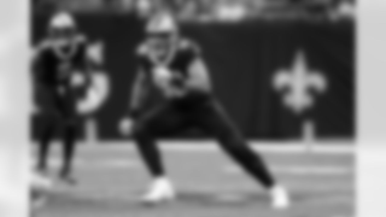 New Orleans Saints defensive end Payton Turner (98) defends during an NFL football game against the Cleveland Browns, Sunday, Nov. 17, 2024, in New Orleans.