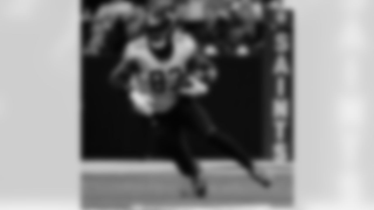 TE Juwan Johnson (83) carries during the New Orleans Saints game against the Arizona Cardinals for Week 1 of the 2025 NFL Season on Sept. 7, 2025 at Caesars Superdome.