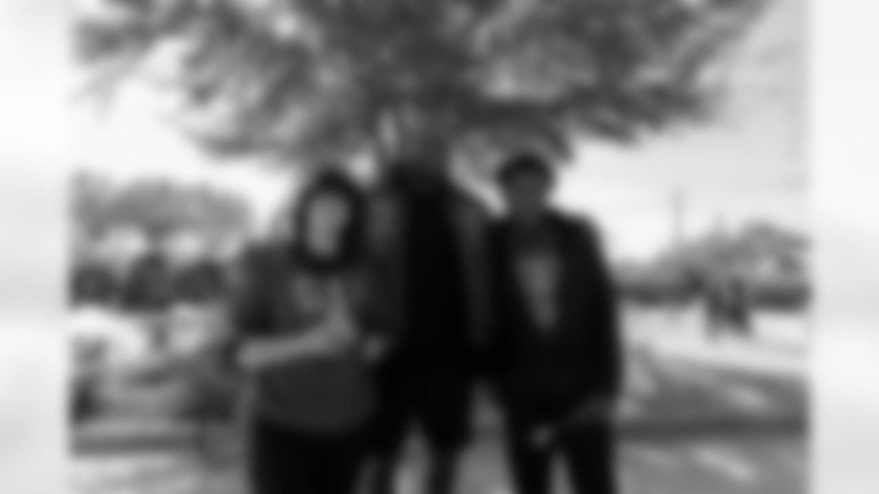 New Orleans Saints quarterback Tyler Shough and defensive end Cam Jordan joined Raising Cane's to surprise 100 kids from the Boys and Girls Club of Metro Louisiana with new bikes and helmets for the holidays on Tuesday, Dec. 9, 2025.