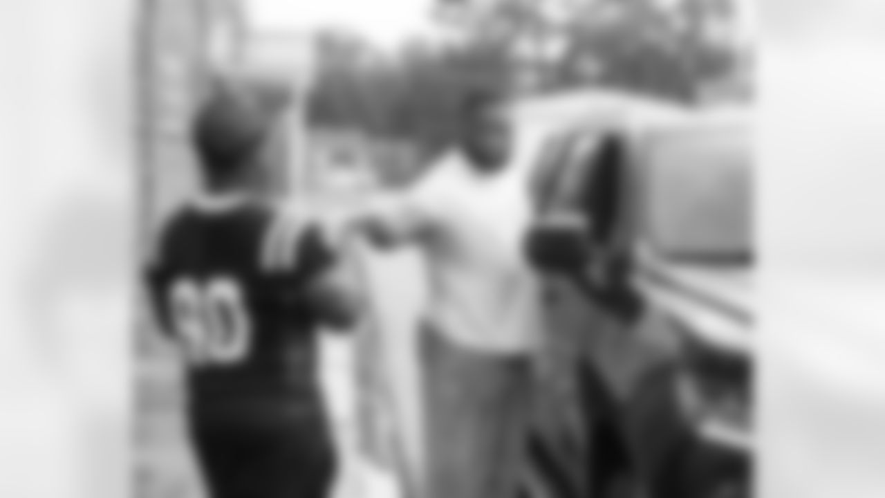 New Orleans Saints defensive tackle Davon Godchaux hosted a Thanksgiving turkey distribution for local residents at the COPAC Community Center on Nov. 25, 2025. The Plaquemine High School football team assisted Godchaux in the giveaway.