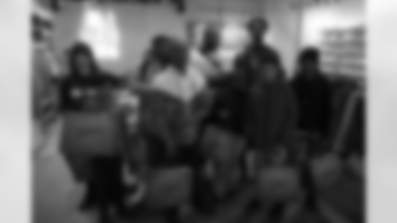 Saints defensive end Cameron Jordan's God Iz Love Foundation hosted a Christmas Kicks Shopping Spree at Sneaker Politics for kids from Youth Empowerment Project on Monday, December 11, 2023.