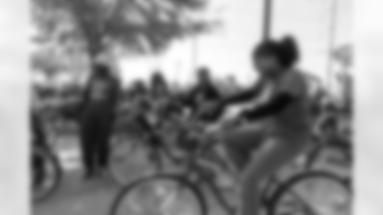 New Orleans Saints quarterback Tyler Shough and defensive end Cam Jordan joined Raising Cane's to surprise 100 kids from the Boys and Girls Club of Metro Louisiana with new bikes and helmets for the holidays on Tuesday, Dec. 9, 2025.